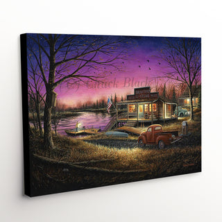 'Good Times' canvas art print showcasing a rustic country store with a shimmering lake under a luminescent night sky
